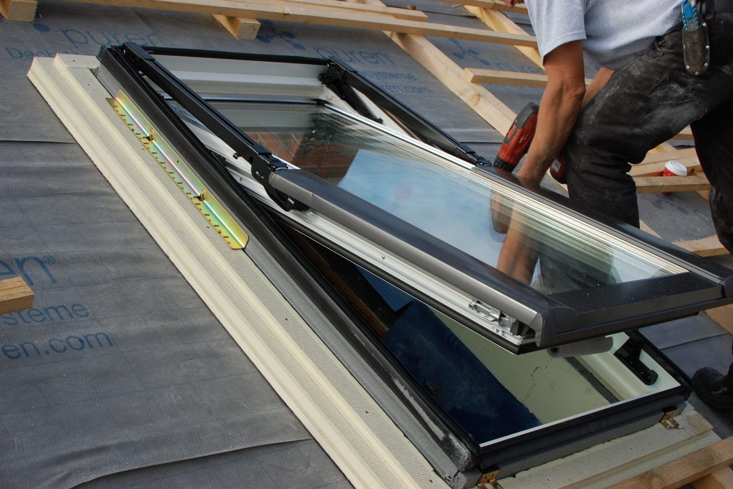 assembling-fitting-a-roof-window-skylight-with-2023-11-27-05-07-57-utc (2)